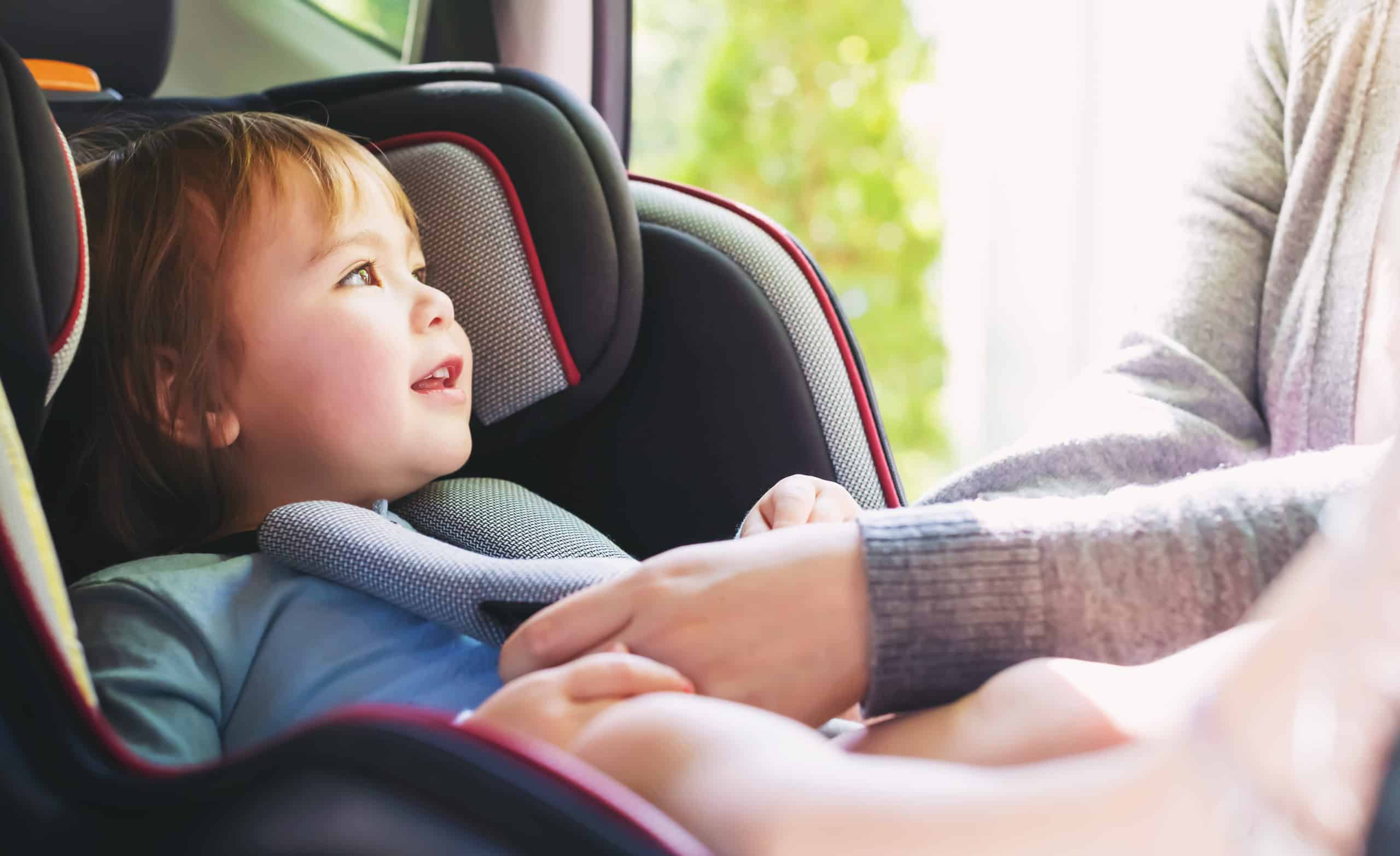 Child in a car seat to prevent child accident injuries