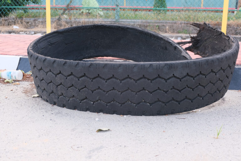 Semi-truck hauling trash overturned on I-20 in Dallas, blocking lanes and causing traffic delays