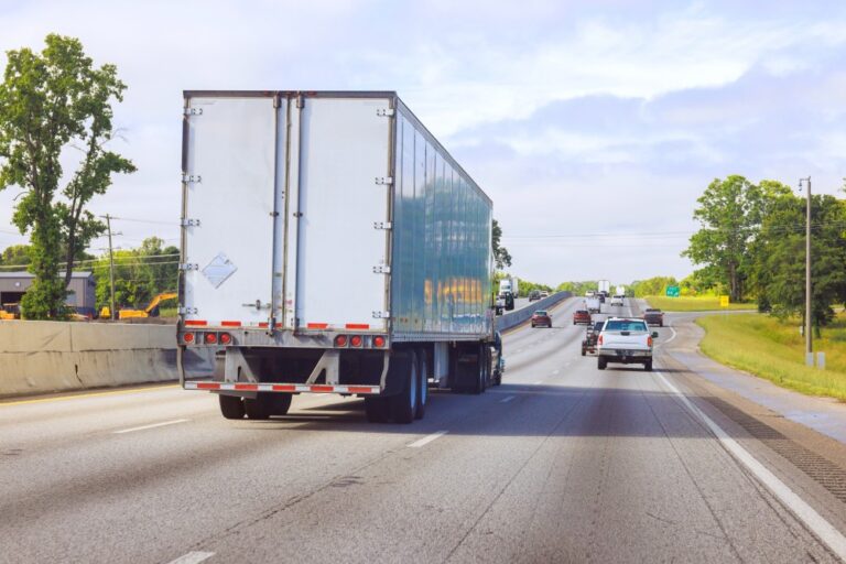 Semi-truck driving on a Texas highway, representing common causes of Texas semi-truck accidents and related injury claims.