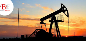 oil field accident lawyers img Oil pump jack working in the Eagle Ford Shale at golden hour, representing the rural onshore oilfield sites where accidents occur